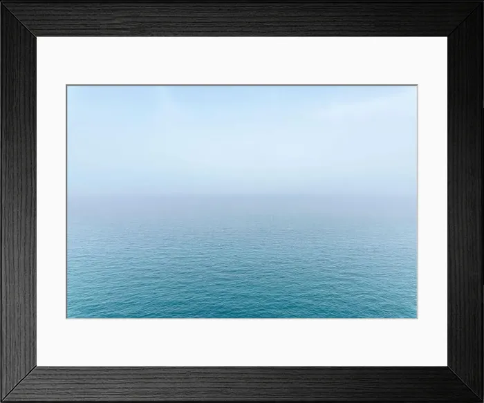 Framed Print : Abstract infinity sea view with small wave pattern and fog on horizon, clear sky in Puglia, Italy Framed Print : Abstract infinity sea view with small wave pattern and fog on horizon, clear sky in Puglia, Italy