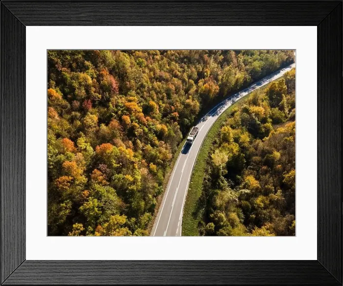 Framed Print : Aerial view drone image on the road trough the trees Framed Print : Aerial view drone image on the road trough the trees