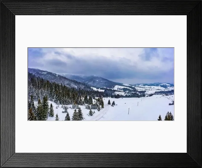 Framed Print : Magical winter panorama of beautiful snowy slopes at a ski resort in Europe on a sunny