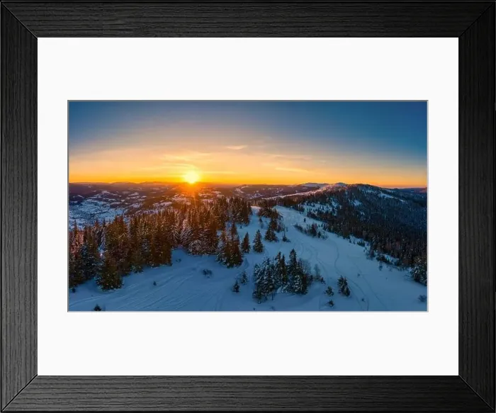 Framed Print : Picturesque winter panorama of mountain hills covered with snow and fir trees on a sunny clear day with the sun Framed Print : Picturesque winter panorama of mountain hills covered with snow and fir trees on a sunny clear day with the sun