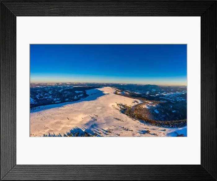 Framed Print : Magical winter panorama of beautiful snowy slopes at a ski resort in Europe on a sunny Framed Print : Magical winter panorama of beautiful snowy slopes at a ski resort in Europe on a sunny