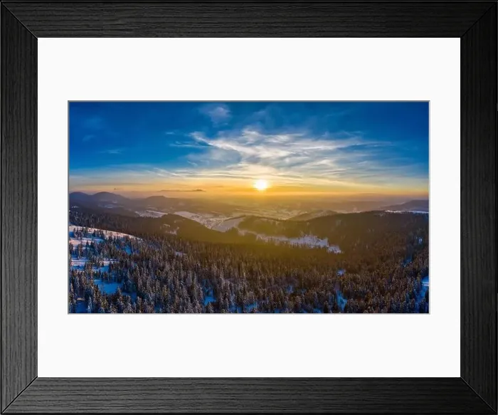 Framed Print : Picturesque winter panorama of mountain hills covered with snow and fir trees on a sunny clear day with the sun Framed Print : Picturesque winter panorama of mountain hills covered with snow and fir trees on a sunny clear day with the sun