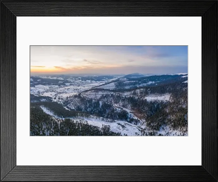 Framed Print : Aerial view of beautiful winter mountain slopes covered with snow and firs forest on a sunny cloudless day Framed Print : Aerial view of beautiful winter mountain slopes covered with snow and firs forest on a sunny cloudless day