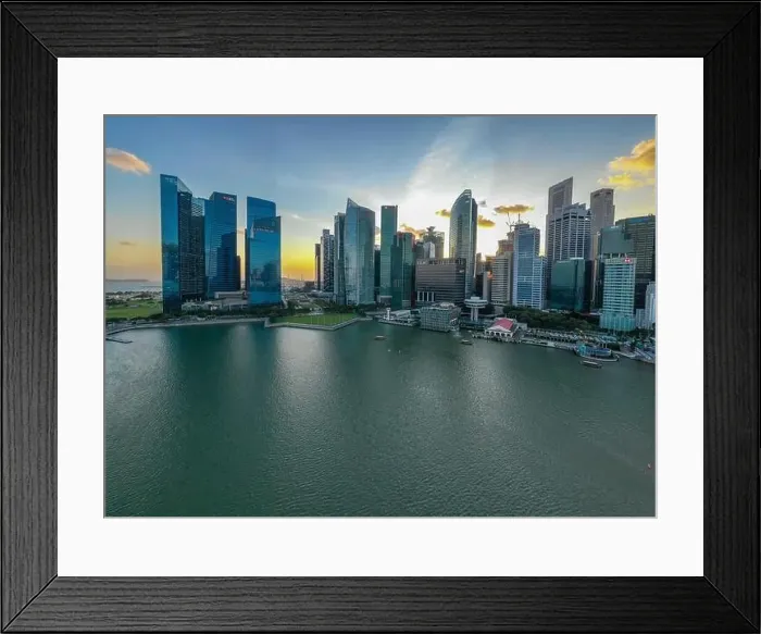Framed Print : SINGAPORE - January 31, 2020: Aerial view of Singapore downtown district in the sunset Framed Print : SINGAPORE - January 31, 2020: Aerial view of Singapore downtown district in the sunset