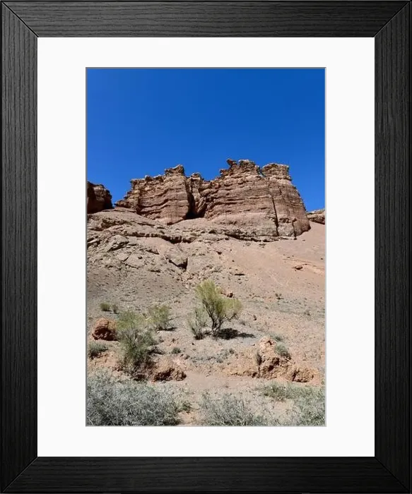 Framed Print : Canyon sunlit view with rocks and a pronounced texture of a yellowish stone, portrait orientation Framed Print : Canyon sunlit view with rocks and a pronounced texture of a yellowish stone, portrait orientation
