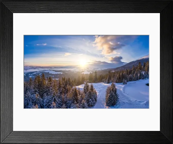 Framed Print : Magical winter panorama of beautiful snowy slopes at a ski resort in Europe on a sunny Framed Print : Magical winter panorama of beautiful snowy slopes at a ski resort in Europe on a sunny