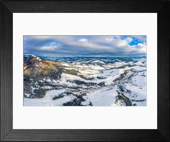 Framed Print : Magical winter panorama of beautiful snowy slopes at a ski resort in Europe on a sunny Framed Print : Magical winter panorama of beautiful snowy slopes at a ski resort in Europe on a sunny