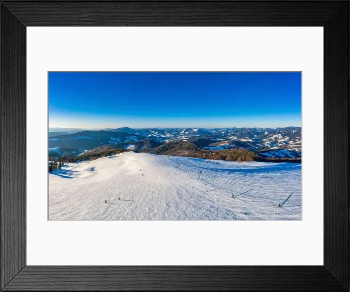 Framed Print : Magical winter panorama of beautiful snowy slopes at a ski resort in Europe on a sunny Framed Print : Magical winter panorama of beautiful snowy slopes at a ski resort in Europe on a sunny
