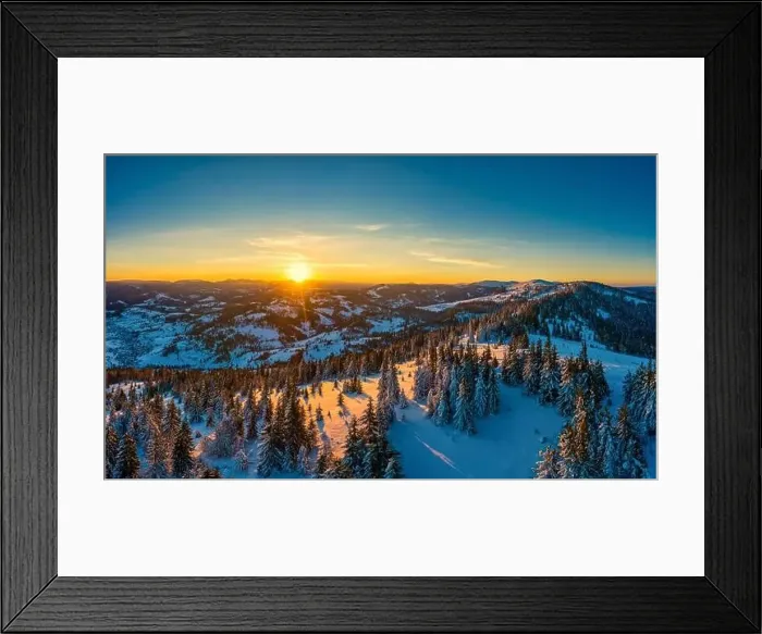 Framed Print : Picturesque winter panorama of mountain hills covered with snow and fir trees on a sunny clear day with the sun Framed Print : Picturesque winter panorama of mountain hills covered with snow and fir trees on a sunny clear day with the sun