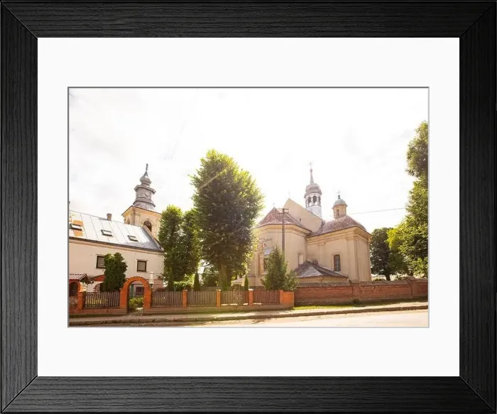 Framed Print : Dobromyl, Ukraine - July, 2021: Catholic church of the Transfiguration in Dobromyl, Ukraine Framed Print : Dobromyl, Ukraine - July, 2021: Catholic church of the Transfiguration in Dobromyl, Ukraine