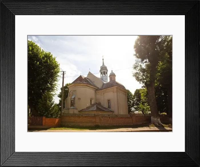 Framed Print : Dobromyl, Ukraine - July, 2021: Catholic church of the Transfiguration in Dobromyl, Ukraine Framed Print : Dobromyl, Ukraine - July, 2021: Catholic church of the Transfiguration in Dobromyl, Ukraine
