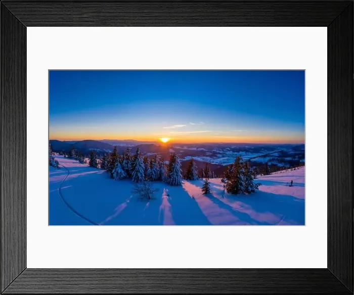 Framed Print : Picturesque winter panorama of mountain hills covered with snow and fir trees on a sunny clear day with the sun Framed Print : Picturesque winter panorama of mountain hills covered with snow and fir trees on a sunny clear day with the sun