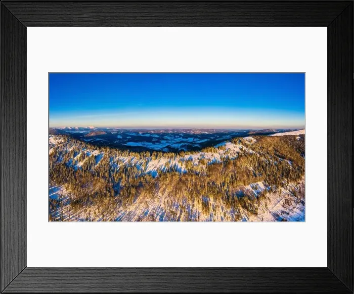 Framed Print : Picturesque winter panorama of mountain hills covered with snow and fir trees on a sunny clear day with the sun Framed Print : Picturesque winter panorama of mountain hills covered with snow and fir trees on a sunny clear day with the sun