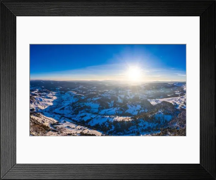Framed Print : Picturesque winter panorama of mountain hills covered with snow and fir trees on a sunny clear day with the sun Framed Print : Picturesque winter panorama of mountain hills covered with snow and fir trees on a sunny clear day with the sun