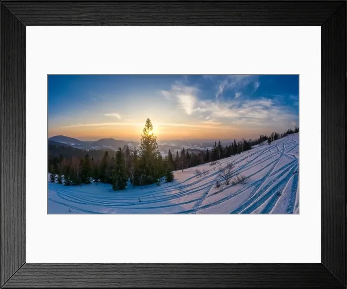 Framed Print : Top view of a beautiful mesmerizing view of the ski slope with ski trails located in the mountains on a sunny winter Framed Print : Top view of a beautiful mesmerizing view of the ski slope with ski trails located in the mountains on a sunny winter