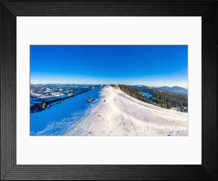 Framed Print : Magical winter panorama of beautiful snowy slopes at a ski resort in Europe on a sunny