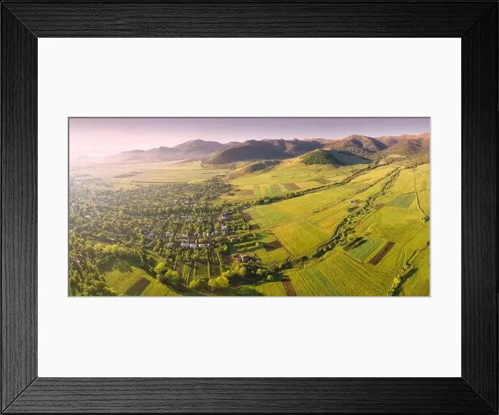Framed Print : Panoramic aerial view of lush green fields and village houses Framed Print : Panoramic aerial view of lush green fields and village houses