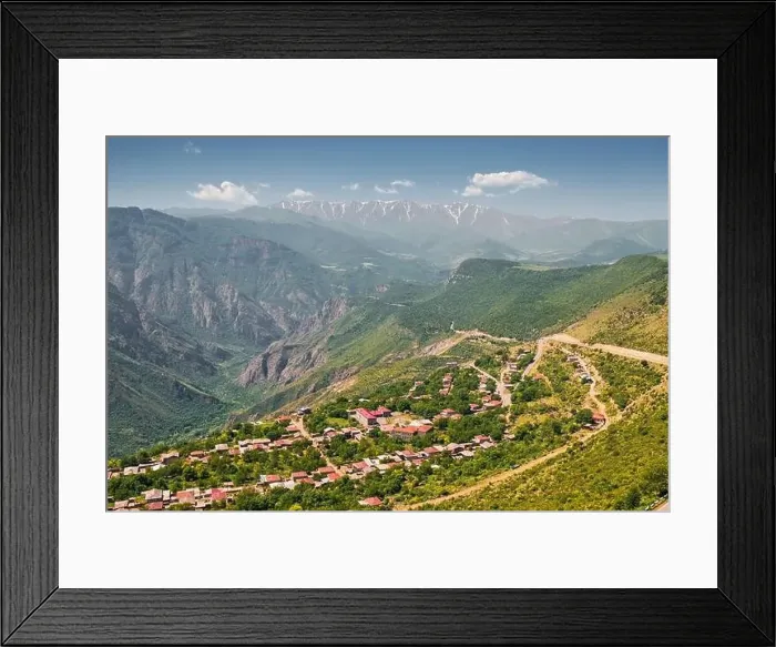 Framed Print : Aerial view of a small town or village in a mountain valley Framed Print : Aerial view of a small town or village in a mountain valley