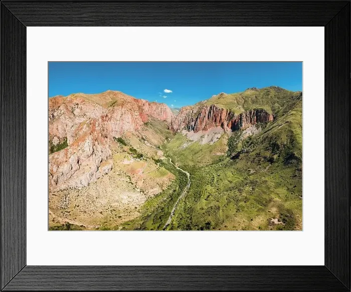 Framed Print : Aerial drone view over an epic gorge in a river valley with red geological rocks Framed Print : Aerial drone view over an epic gorge in a river valley with red geological rocks