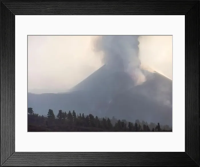 Framed Print : Breathtaking aerial view of mountain landscape with erupting Cumbre Vieja volcano emitting magma covered under thick Framed Print : Breathtaking aerial view of mountain landscape with erupting Cumbre Vieja volcano emitting magma covered under thick