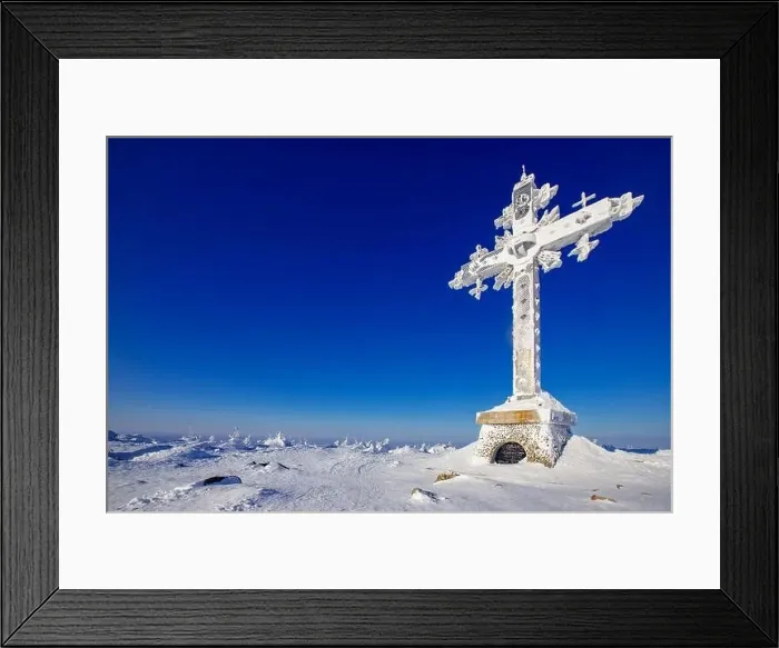 Framed Print : Cold landscape worship cross mountain with blue sky Kemerovo region Russia in winter forest