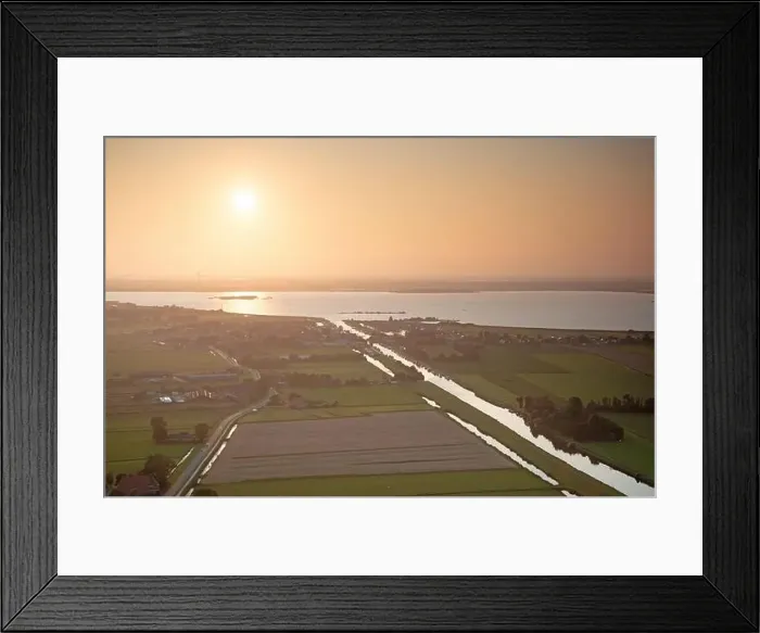 Framed Print : Agricultural landscape of Friesland, one of the northern provinces of the Netherlands - Friesland from above - Canal Framed Print : Agricultural landscape of Friesland, one of the northern provinces of the Netherlands - Friesland from above - Canal