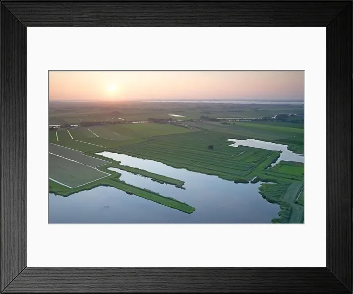 Framed Print : Agricultural landscape of Friesland, one of the northern provinces of the Netherlands - Friesland from above Framed Print : Agricultural landscape of Friesland, one of the northern provinces of the Netherlands - Friesland from above