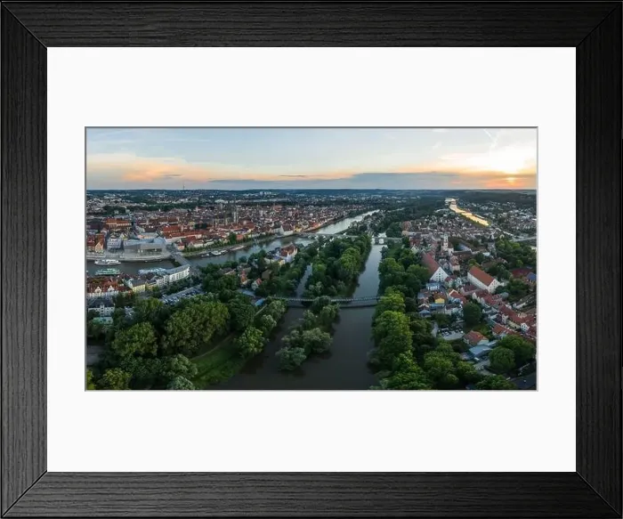 Framed Print : Panorama of the city of Regensburg in Bavaria with the river Danube the illuminated cathedral Framed Print : Panorama of the city of Regensburg in Bavaria with the river Danube the illuminated cathedral