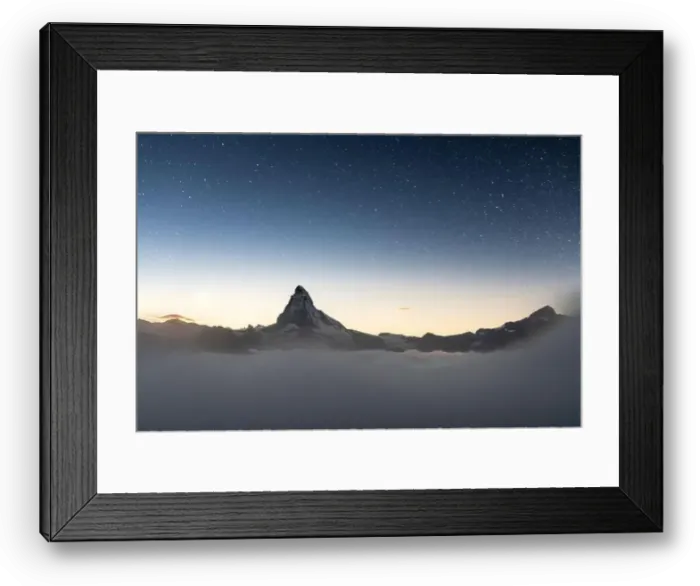 Framed Print : Stars in the night sky over Matterhorn peak emerging from fog, Zermatt, Valais canton, Switzerland Framed Print : Stars in the night sky over Matterhorn peak emerging from fog, Zermatt, Valais canton, Switzerland