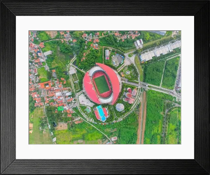 Framed Print : Aerial top down view of the Beautiful scenery of Wibawa Mukti Stadium when sunrise. with Bekasi cityscape background Framed Print : Aerial top down view of the Beautiful scenery of Wibawa Mukti Stadium when sunrise. with Bekasi cityscape background