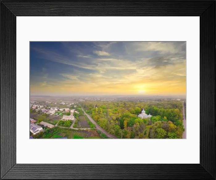 Framed Print : Sunrise over the park located in the village. Fog over the trees and the church in the park Framed Print : Sunrise over the park located in the village. Fog over the trees and the church in the park