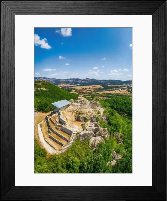 Framed Print : Drone top view Thracian sanctuary, located near Tatul, Bulgaria, Carved grave cut in the rock, II millennium BC Framed Print : Drone top view Thracian sanctuary, located near Tatul, Bulgaria, Carved grave cut in the rock, II millennium BC