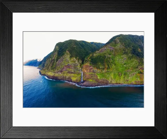Framed Print : Aerial view of a waterfall near Seixal village in the Madeira Islands, Portugal Framed Print : Aerial view of a waterfall near Seixal village in the Madeira Islands, Portugal