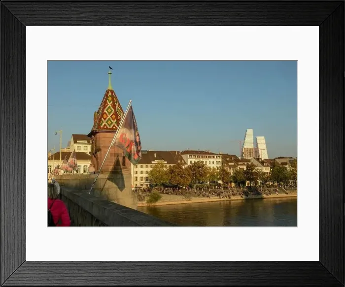 Framed Print : Basel, Switzerland - 17 Oktober 2021: people relaxing by the river Rhine at Basel in Switzerland Framed Print : Basel, Switzerland - 17 Oktober 2021: people relaxing by the river Rhine at Basel in Switzerland