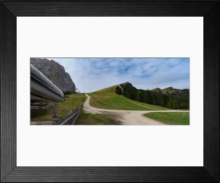 Framed Print : Summer ski resort. Dolomites in European Alps. Shot in summer with green grass and no snow Framed Print : Summer ski resort. Dolomites in European Alps. Shot in summer with green grass and no snow