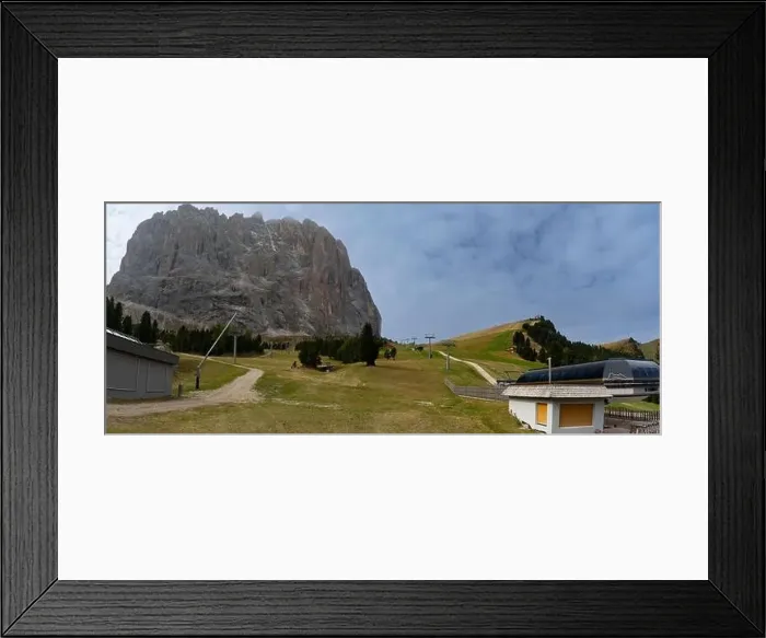 Framed Print : Summer ski resort. Dolomites in European Alps. Shot in summer with green grass and no snow Framed Print : Summer ski resort. Dolomites in European Alps. Shot in summer with green grass and no snow
