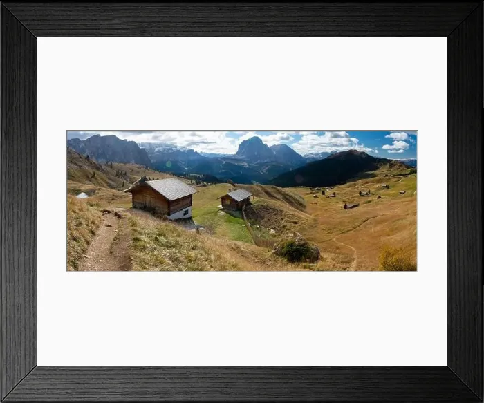 Framed Print : Scenic Wodden Cabins in the Dolomites, European Alps. Shot in summer with green grass and no snow. Gardena Pass, Italy Framed Print : Scenic Wodden Cabins in the Dolomites, European Alps. Shot in summer with green grass and no snow. Gardena Pass, Italy