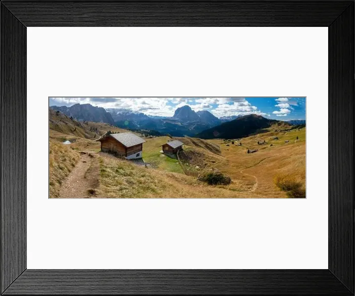 Framed Print : Scenic Wodden Cabins in the Dolomites, European Alps. Shot in summer with green grass and no snow. Gardena Pass, Italy Framed Print : Scenic Wodden Cabins in the Dolomites, European Alps. Shot in summer with green grass and no snow. Gardena Pass, Italy