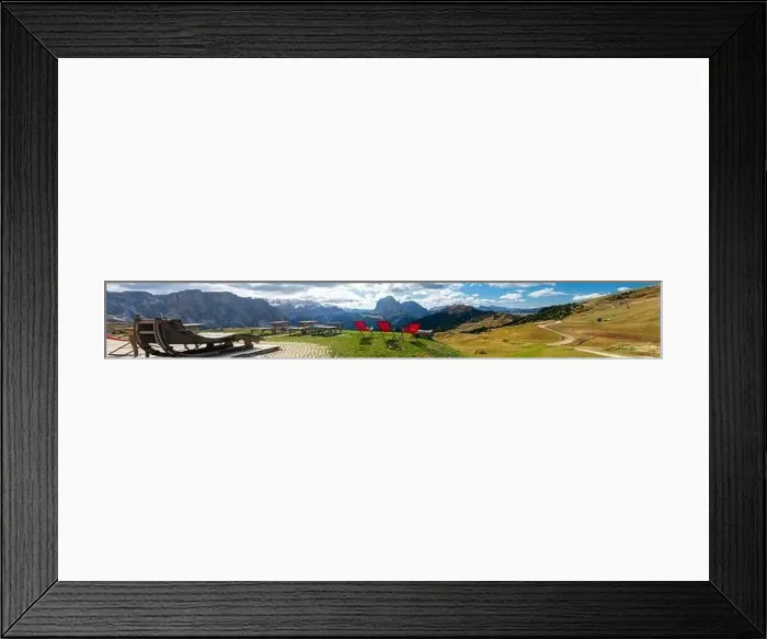 Framed Print : Red lawn chairs with dramtic Mountain background. Dolomites in European Alps. Gardena Pass, Italy. Vacation Theme Framed Print : Red lawn chairs with dramtic Mountain background. Dolomites in European Alps. Gardena Pass, Italy. Vacation Theme