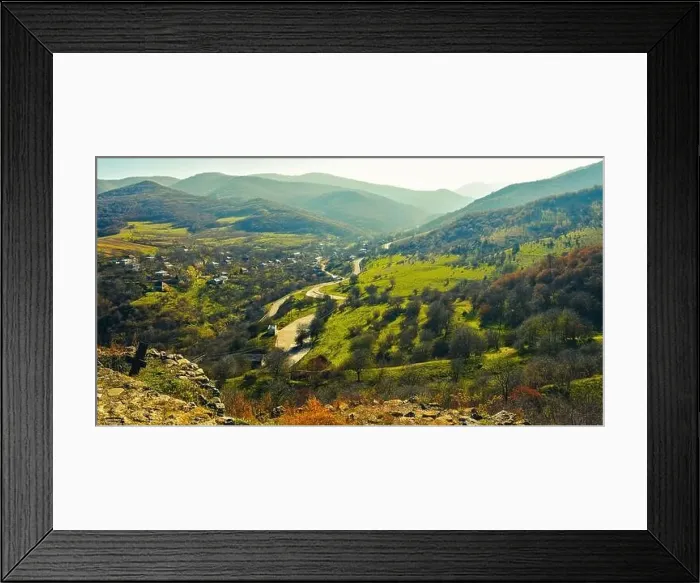 Framed Print : Dmanisi countryside panorama with traditional georgian houses, road and mountains background Framed Print : Dmanisi countryside panorama with traditional georgian houses, road and mountains background