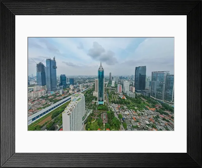 Framed Print : Aerial view of BNI 46 building in Jakarta and noise cloud with cityscape Framed Print : Aerial view of BNI 46 building in Jakarta and noise cloud with cityscape