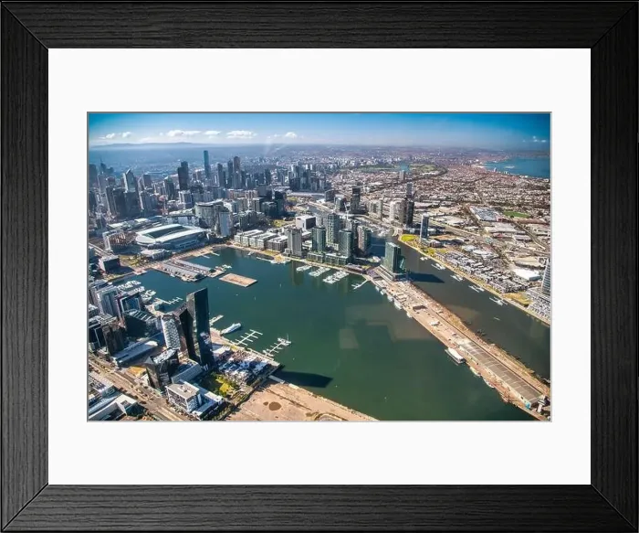 Framed Print : MELBOURNE, AUSTRALIA - SEPTEMBER 8, 2018: Aerial city skyline from helicopter. Downtown and Yarra river