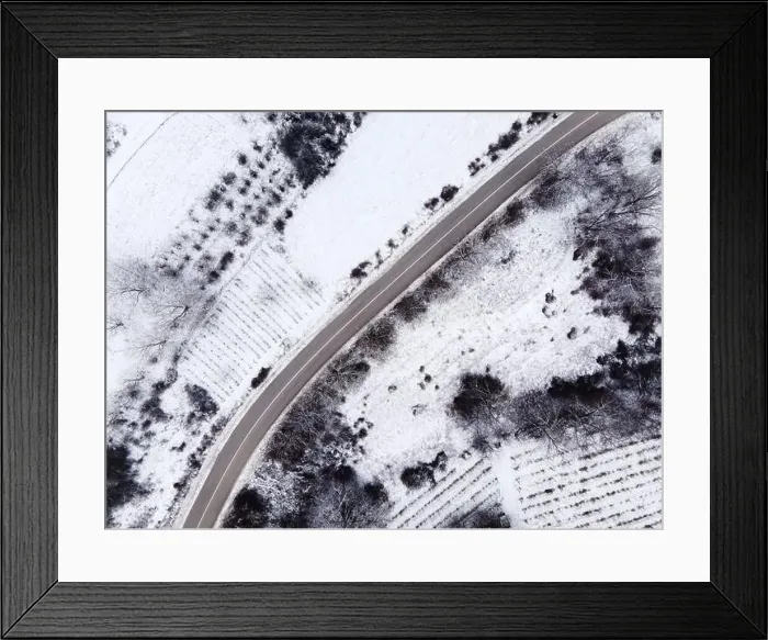 Framed Print : High angle top down aerial view drone image on road trough the trees Framed Print : High angle top down aerial view drone image on road trough the trees