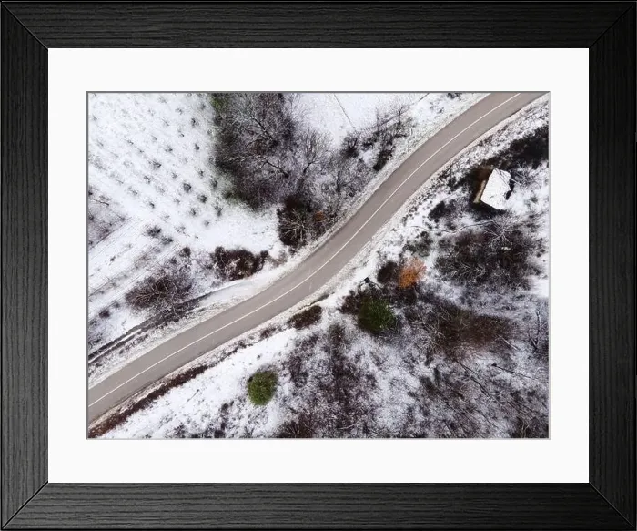 Framed Print : High angle top down aerial view drone image on road trough the trees Framed Print : High angle top down aerial view drone image on road trough the trees