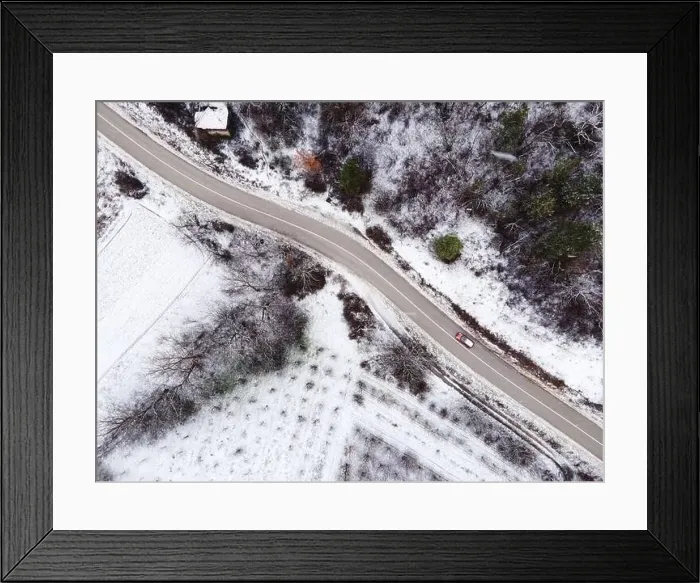 Framed Print : High angle top down aerial view drone image on road trough the trees Framed Print : High angle top down aerial view drone image on road trough the trees