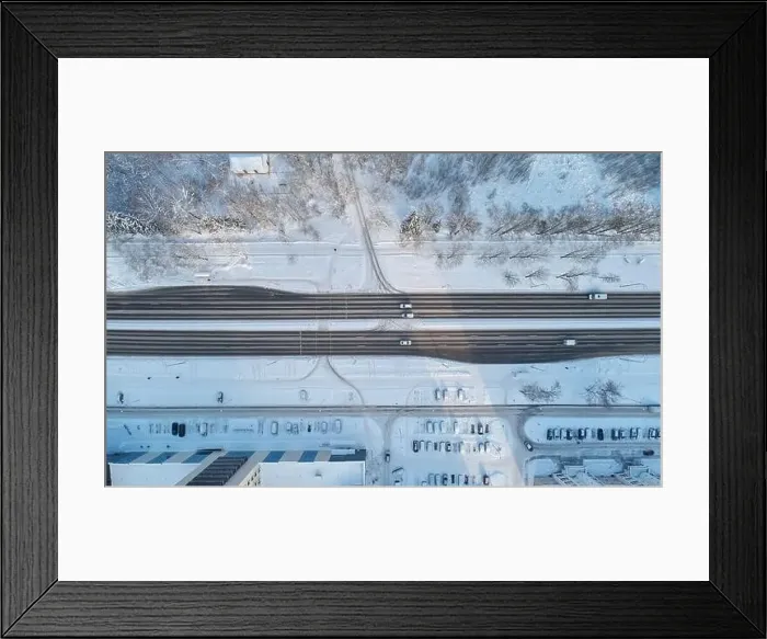 Framed Print : Car move on frozen road aerial above top drone view Framed Print : Car move on frozen road aerial above top drone view