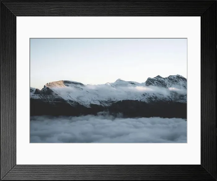 Framed Print : Mist at sunrise covering Faulhorn mountain peak in the clouds, Mannlichen, Jungfrau Region, Bern canton, Switzerland