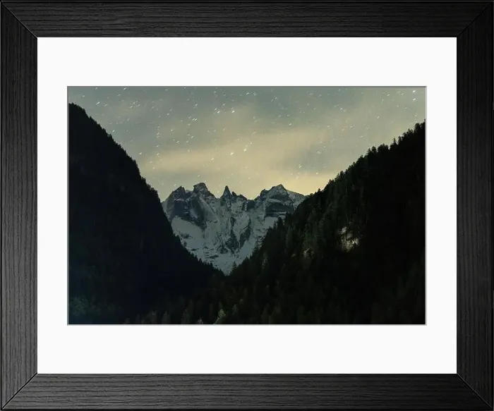 Framed Print : Starry night sky over the Sciore mountain peaks and woods, Val Bondasca, Val Bregaglia, Graubunden canton, Switzerland Framed Print : Starry night sky over the Sciore mountain peaks and woods, Val Bondasca, Val Bregaglia, Graubunden canton, Switzerland
