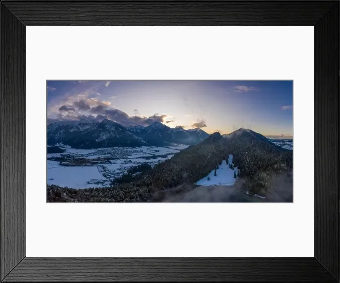 Framed Print : mountain vilsegg and vils city at lake alatsee at snowy winter while sunset sky Framed Print : mountain vilsegg and vils city at lake alatsee at snowy winter while sunset sky