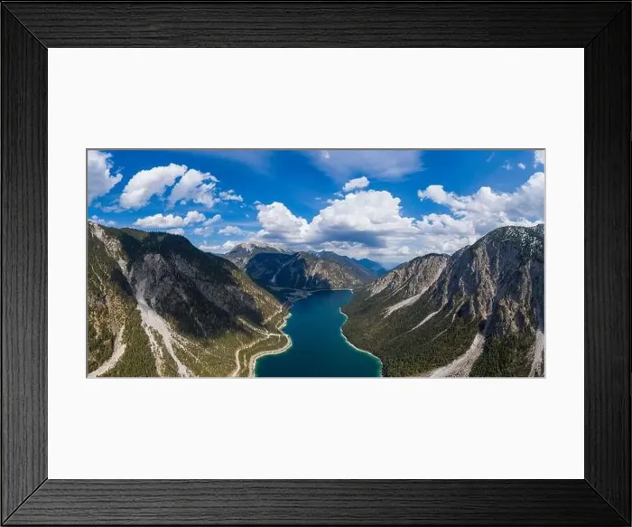 Framed Print : aerial view to blue lake plansee panorama at spring surrounded from tirol mountain alps